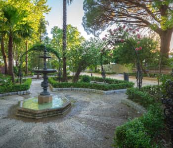 Residential landscaping with lush lawn and flower beds by NV Spaces